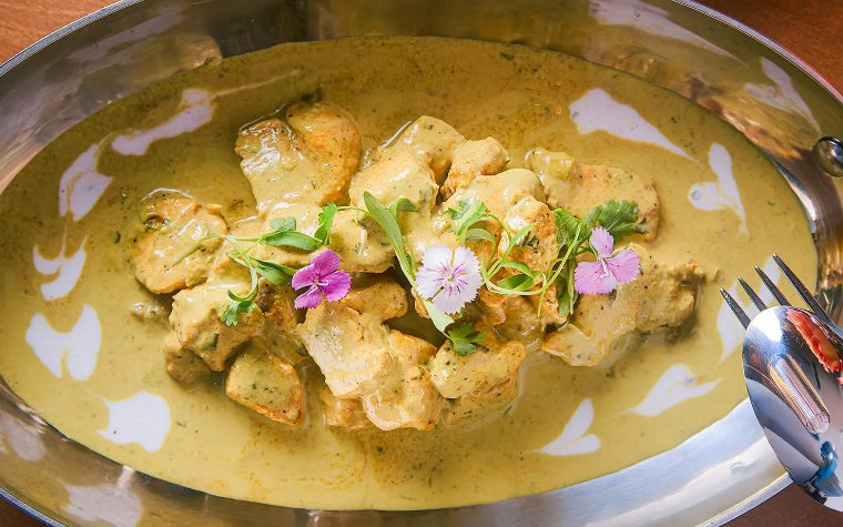 Chicken curry with flower decoration Chicken curry with flower decoration