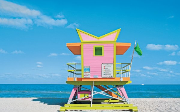 Pink lifeguard house on the sands of South Beach