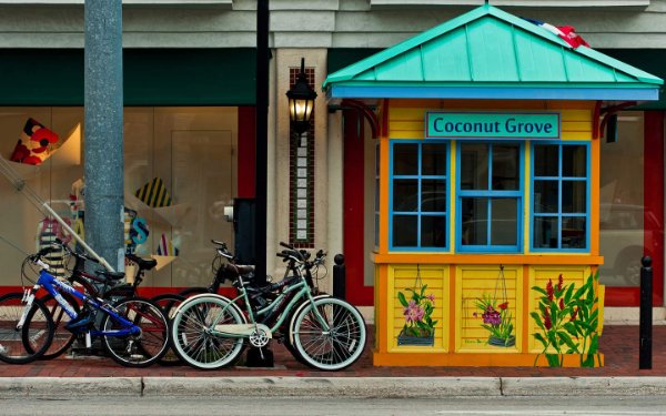 Yellow and teal information booth in Coconut Grove