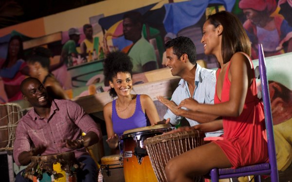 Friends playing drums at Little Haiti Cultural Complex