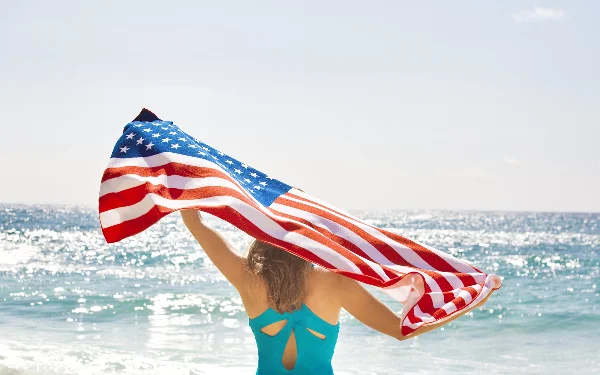 Lady with Flag at the Beach