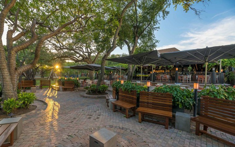 Exterior of Glass & Vine restaurant in Peacock Park