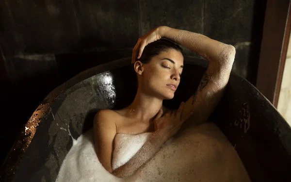  Spa bath salts with purple flowers and hot stones to sooth your senses