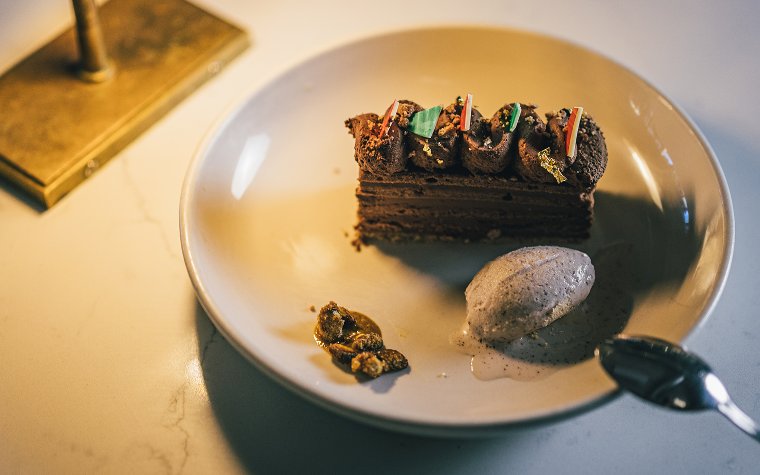 Rich chocolate cake dessert served at Doya Rich chocolate cake dessert served at Doya