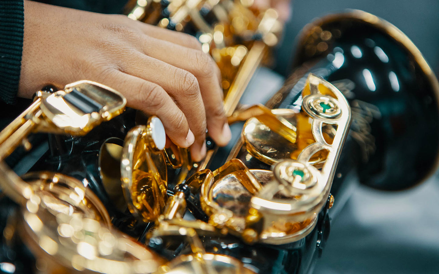 Musicians playing a saxophone