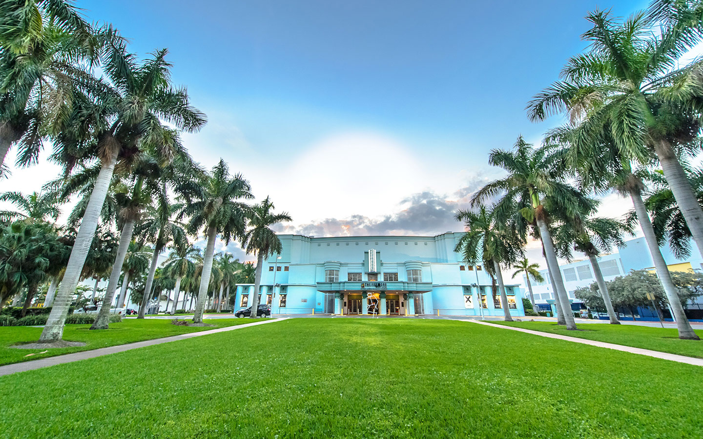 View of the serene Fillmore Lawn, an outdoor venue adorned with vibrant greenery and inviting seating arrangements View of the serene Fillmore Lawn, an outdoor venue adorned with vibrant greenery and inviting seating arrangements