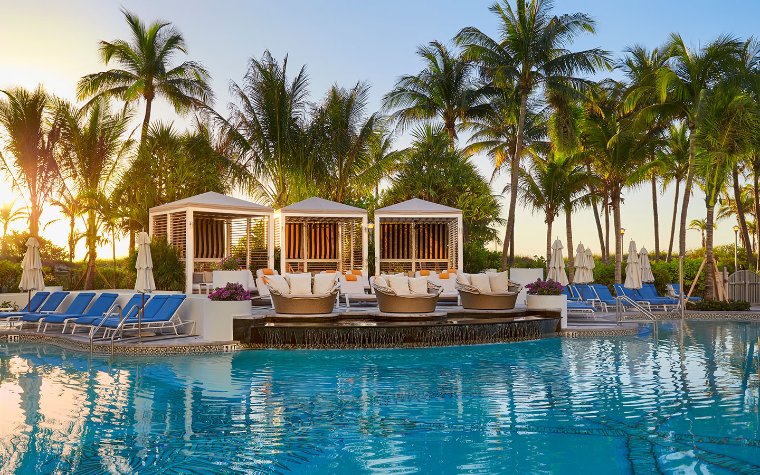 Loews Hotel pool and cabana area with lush surroundings