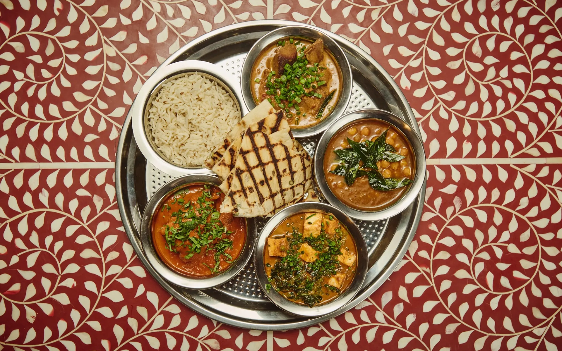Table spread at Ghee Indian Kitchen in Wynwood Table spread at Ghee Indian Kitchen in Wynwood