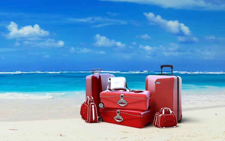 Luggage bags on the beach Luggage bags on the beach